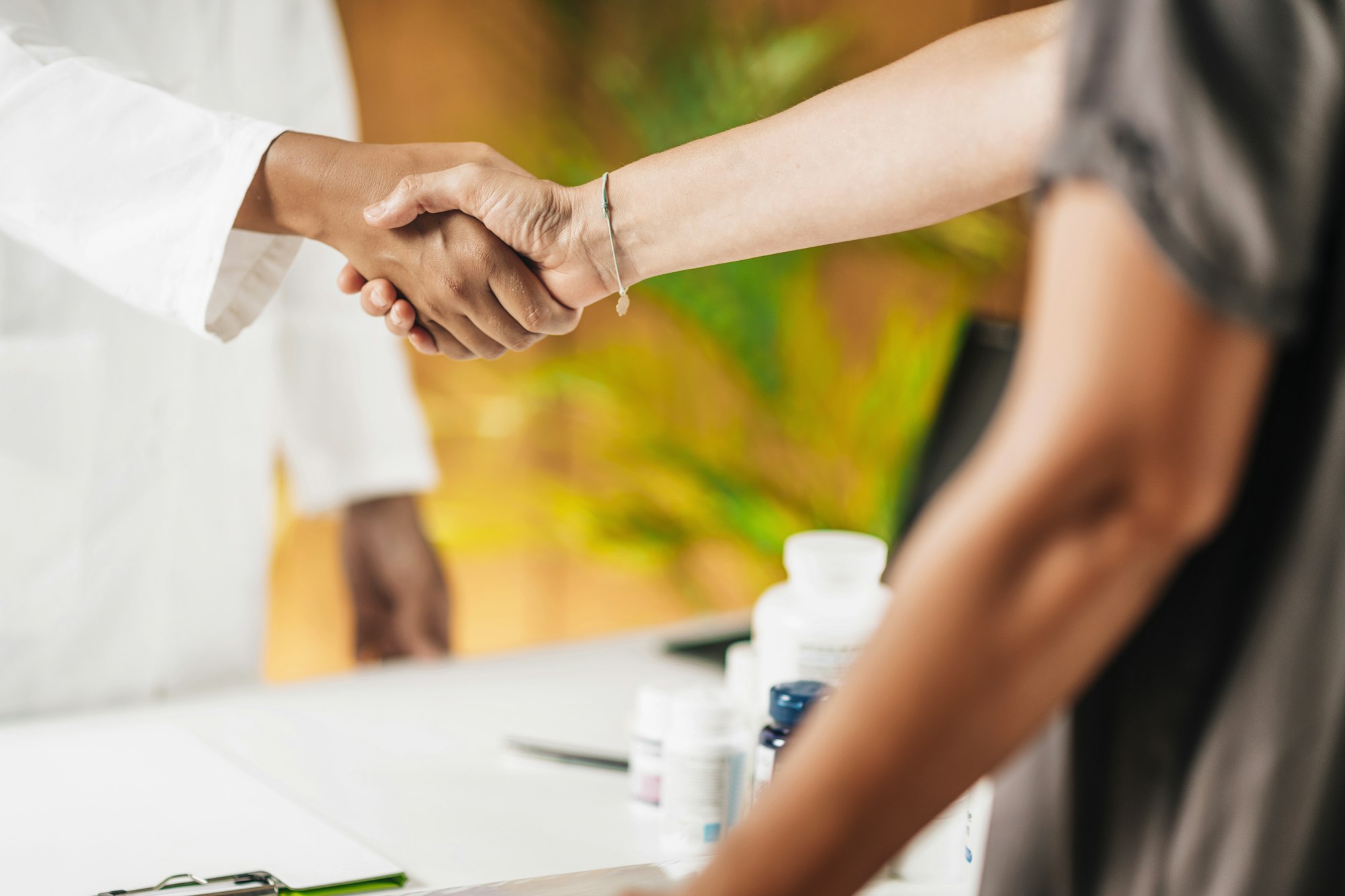 Functional Medicine Doctor Shaking Hands with Patient